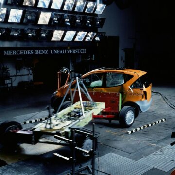 Mercedes-Benz A-Class, model series 168, crash tests, 1996. The A-Class meets all current and future safety requirements for a frontal and side impact. It absolved an extensive test programme in just 32 months. The engineers conducted more than 50 crash tests with prototypes and pre-series models, so as to optimise the safety concept. The result: The A-Class meets the future legal requirements for side impacts as well as the EU requirements for frontal impact valid from 1998. The occupants of the A-Class were also very well protected in an impact with a larger vehicle. It met all internal Mercedes-Benz safety criteria, which were far more stringent than the statutory requirements. The extensive development programme also included the offset crash into larger and heavier vehicles.