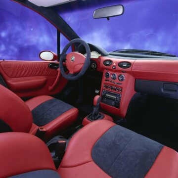 Mercedes-Benz A-Class, model series 168, show car Turin/Italy, 1998. Interior designo leather in imperial red (X24). The designo range of materials and interior colours for individualisation already presented at the 1995 IAA show (here black leather and Alcantara®) was also available for the Mercedes-Benz A-Class.