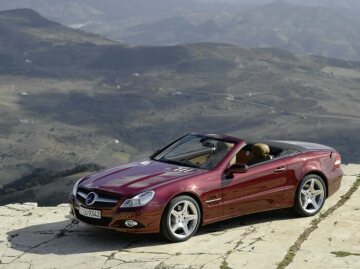 Mercedes-Benz SL 500, 230 series, 2008 version. Storm red metallic, leather upholstery in a natural beige tone