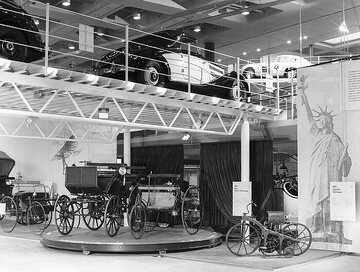 Auto history staged: The Daimler-Benz Museum opens on time. Birthday of the automobile again its doors for visitors from all over the world. In the foreground the first motorcycle in the world, the Daimler "riding car" (1885) and the first automobiles: Benz patent motor car (1885), Daimler motor carriage (1886).