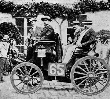 At the world´s first automobile race from Paris to Rouen covering a distance of 126 km (78 miles) in 1894, vehicles with Daimler engines manufactured by licence win the first four places. Here, we see Albert Lemaitre´s Peugeot, in the left rear seat: Adolphe Clément.