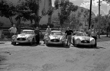 Third Carrera Panamericana Mexico, 1952. The winning team of Karl Kling / Hans Klenk at the wheel of the Mercedes-Benz 300 SL during a tyre change. The windscreen is already broken following a collision with a vulture.