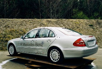 Mercedes-Benz E-Class Saloon Guard, 211 series, early version 2002 - 2006 in ballistics test by the proofhouse in Ulm/Germany. The Special Protection Package (High Protection B42006 ) was available for the E 320 CDI, E 350 and E 500 models, and only in conjunction with the AVANTGARDE equipment line.