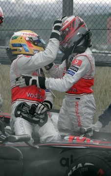 Formula 1: World Championship 2008, GP of Brazil:
Lewis Hamilton, Vodafone McLaren Mercedes, 2008 Formula 1 World Champion - congratulations from team mate Heikki Kovalainen (right)