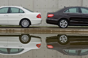 Mercedes-Benz E-Class Saloon, model series 212, 2009 version, in comparison with the predecessor models, E-Class Saloon of the direct predecessor model series 211 (2002 - 2009) in Calcite White.