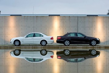 Mercedes-Benz E-Class Saloon, model series 212, 2009 version, in comparison with the predecessor models, E-Class Saloon of the direct predecessor model series 211 (2002 - 2009) in Calcite White.