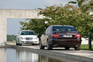 Mercedes-Benz E-Class Saloon, model series 212, 2009 version, in comparison with the predecessor models, E-Class Saloon of the direct predecessor model series 211 (2002 - 2009) in Calcite White.